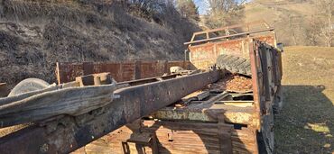 Yük maşınları üçün qoşqular: Bortları açılan kuza. Uzunluğu 4,3 m Eni 2,5 m Tam dəmir kuza — 11