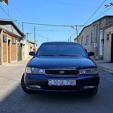 qəzali: Kia Clarus: 2 l | 1997 il Sedan — 2