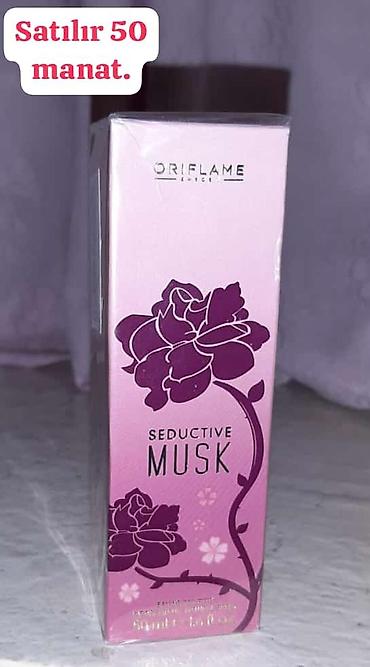 Ətriyyat: Oriflame brendinə aid "Dancing Lady Hypnotic Night" ətri. Bu ətir 50 — 62