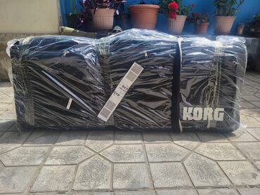 Futlyarlar, çexollar: Korg klaviatura daşımaq üçün nəzərdə tutulmuş bu qara rəngli çanta — 13