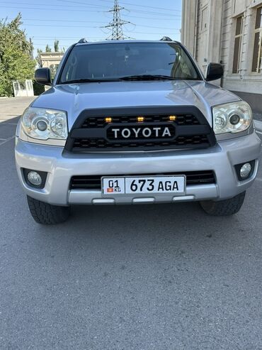 коробка передач на гольф 4: Внедорожник Toyota 4Runner серебристого цвета с черной решеткой