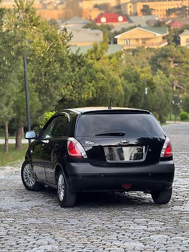Kia: Kia Rio hatchback Xarici görünüş: - Rəng: qara - 5 qapılı hatchback — 2