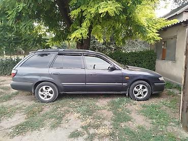mazda 323 2003: Mazda 626: 1999 г., 2 л, Автомат, Бензин, Универсал — 5