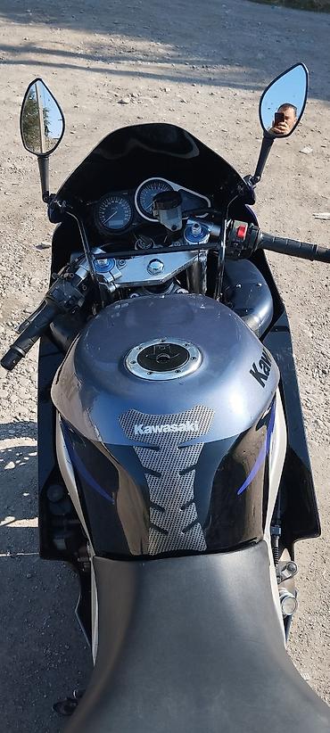 диск 4х100: Kawasaki Ninja, спортивный мотоцикл в фирменной черно-синей окраске — 4