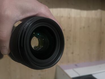 Foto və video aksesuarları: Sigma 35mm f/1.4 DG HSM canon ideal veziyetde cox az islenmis ustada