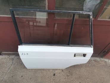 Auto delovi: Vrata zadnja leva Lada 2104 Karavan(bela)ZL3. Skinuta sa rastavljenog — 2