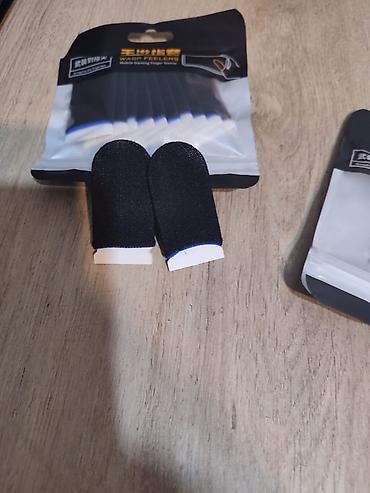 bluetooth gamepad: 🎮 Mobil oyunlar üçün barmaq qoruyucu (finger sleeve) satılır. Nəfəs — 3