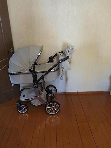 Çıxarıla bilən beşikli araba, Kidilo, Yeni, Yaş: 1-6 ay, Ünvandan götürmə