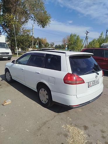 bid машина: Nissan Wingroad: 2004 г., Автомат, Бензин, Универсал — 5