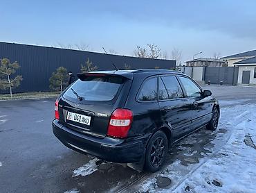 Mazda: Mazda 323: 2000 г., 1.8 л, Механика, Бензин, Универсал — 3