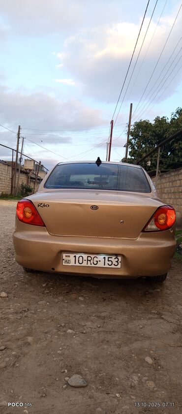 Kia: Kia Rio: 1.5 l | 2002 il Sedan — 12