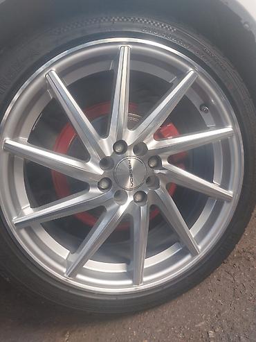 disqler: Satılır: Yay mövsümü üçün avtomobil şini Ölçü: 215/40 ZR17 87W Tip — 5