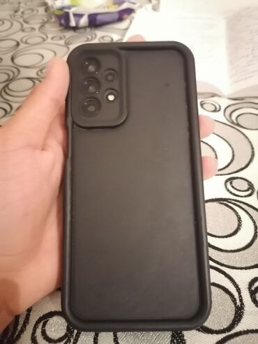 Kabrolar: Qara rəngdə, a23 128gb 6+2 dir.üzündə balacs çatı var endirim