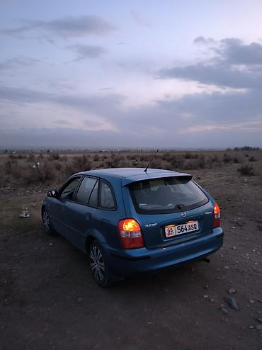 Mazda: Mazda 323: 1999 г., 1.5 л, Механика, Бензин, Универсал — 9
