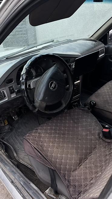 gac aion lx plus: Daewoo Nexia: 2012 г., Механика, Седан — 4