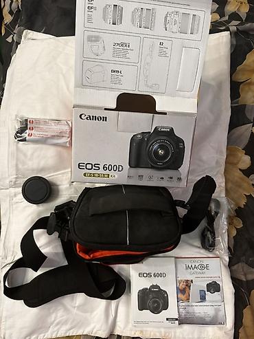 Фотоаппараты: Зеркальная камера Canon EOS 600D (Kit) Комплектация по фото: - Тушка — 13