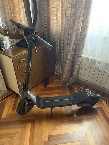elektrikli skuter: Elektrikli skuter – şəhər içi rahat və çevik hərəkət üçün — 3