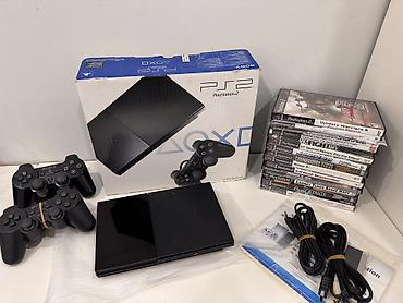 ps2 gta: Playstation 2 Slim İdeal vəziyyətdə, 2 pult, memory kart, qutuda. Çox — 2