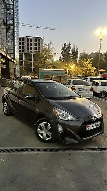 100: Toyota Prius C: 2015 г., 1.5 л, Автомат, Гибрид, Хэтчбэк — 2
