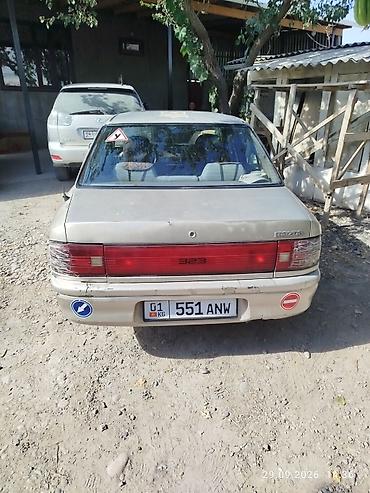 Mazda: Mazda 323: 1992 г., 1.6 л, Автомат, Бензин, Седан — 4