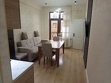 divan fabrika: 2 otaqlı mənzil – tam mebel və texnika ilə Planlama: - Qonaq otağı — 2