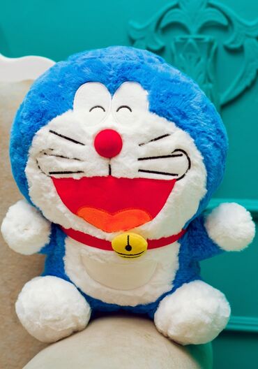 oyuncaq gitara: Doraemon personajının yumşaq oyuncağı. Mavi rəngdədir, üzərində