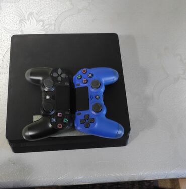 s10 tb: Ps 4 slim 1 tb yaddaş. Versiya 12.0. Orginal. Ustada olmayıb və blompu