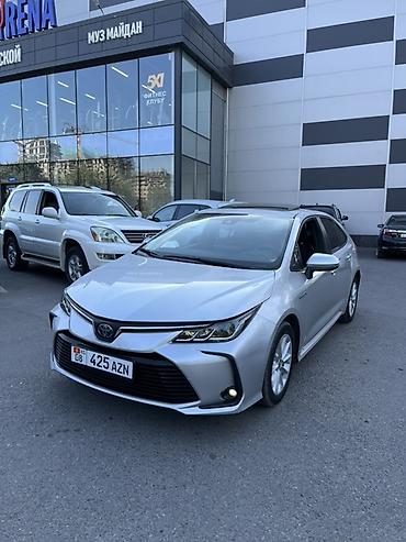 селика: Toyota Corolla: 2020 г., 1.8 л, Автомат, Гибрид, Седан — 2