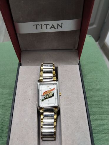 бренд микс ош мужская одежда: Наручные часы TITAN, в отличном состоянии, Индия