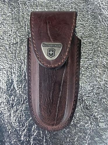 Аңчылык жана балык уулоо: Мультитул-нож Victorinox с кожаным чехлом - Бренд: Victorinox (клинок — 7
