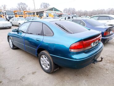 Mazda: Mazda Cronos: 1992 г., 1.8 л, Механика, Бензин, Хэтчбэк