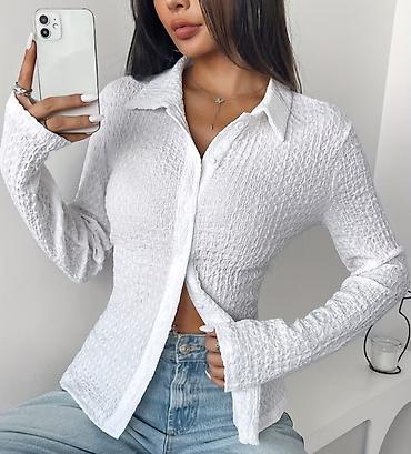 Köynək və bluzalar: Köynekler yenidir. Hər biri 10 azn. Təkcə qalın zolaqlı sweater S — 2
