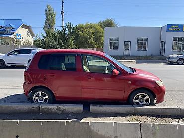 10 5j: Mazda Demio: 2004 г., 1.3 л, Автомат, Бензин, Хэтчбэк — 1