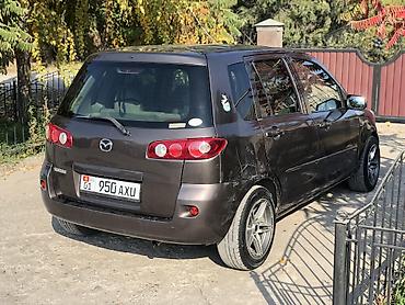 с 500: Mazda Demio: 2005 г., 1.3 л, Автомат, Бензин, Хэтчбэк — 4