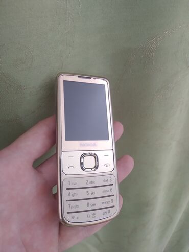 нокия х2 02: Nokia 6700 Slide, Колдонулган, түсү - Алтын, 1 SIM