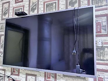 skyworth 43e55g: Телевизор Skyworth, диагональ около 40–43". Плоская LED‑панель, тонкая — 3