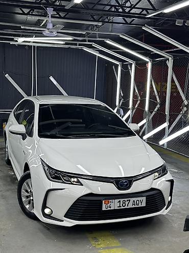 ev: Toyota Corolla: 2022 г., 1.8 л, Вариатор, Гибрид, Седан — 2