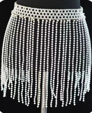 Ətəklər: Makrame toxunuşlu, ağ rəngdə qısa ətək. Bu ətək kəmər hissəsində iplə — 9