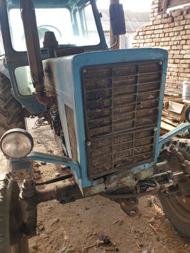 Тракторы МТЗ (Беларус): Трактор МТЗ «Беларус» с кабиной, сзади трехточечная навеска и ВОМ — 5