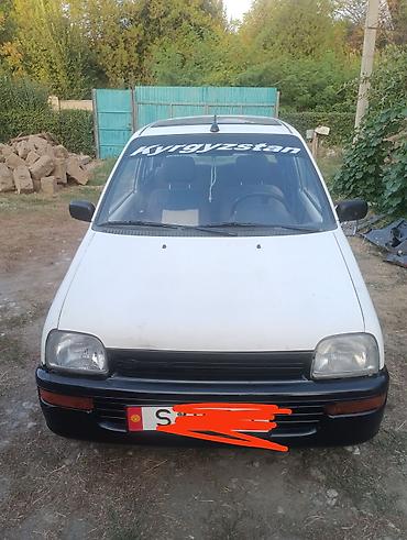 Другой транспорт: Продаю дайхатцу куоре белый г.в 1993 об.0.8 трёхдверный хетчбек 5 Ти — 9