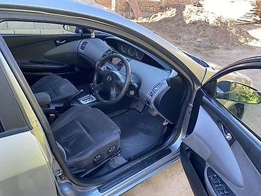 диски на авто: Nissan Primera: 2003 г., 2 л, Автомат, Бензин, Седан — 4