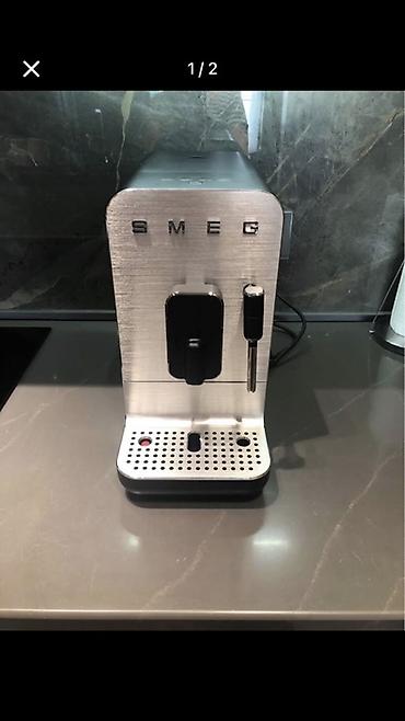 par utusu: SMEG avtomatik qəhvə aparatı - Kompakt, müasir dizayn: ön paneli — 1