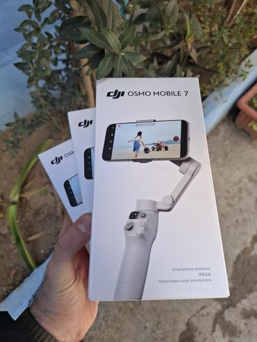 Telefon üçün stabilizatorlar: Dji Osmo mobile 7 Qiymətə görə yazmıyın !!! Yeni bağlı qutu! Qiymət