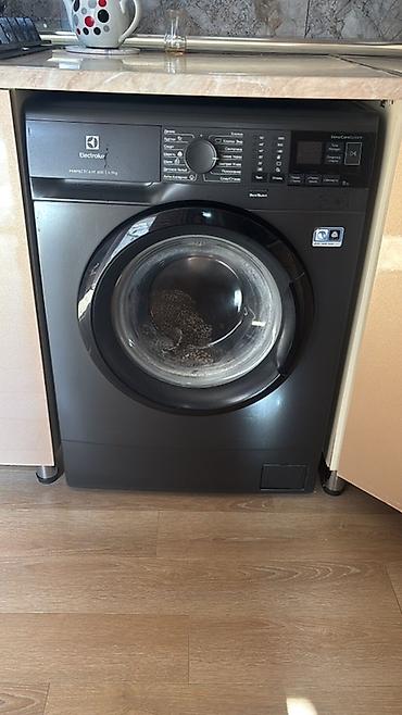 15 pro 256: Electrolux PerfectCare 600 paltaryuyan maşın - Ön yükləməli, qara — 2