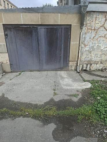 bine qəsəbəsi: Qaraj qapısıdı köhnə sovetin materialıdı çox möhkəm ağırdı, sadəcə — 1