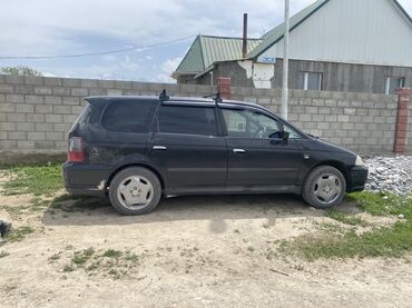 калпак цена бишкек: Черный минивэн Honda Odyssey с рейлингами на крыше. Автомобиль