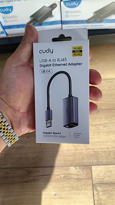 a 10 kabro: Cudy UE10A USB-A to RJ45 Gigabit Ethernet Adapter - USB-A portundan — 1