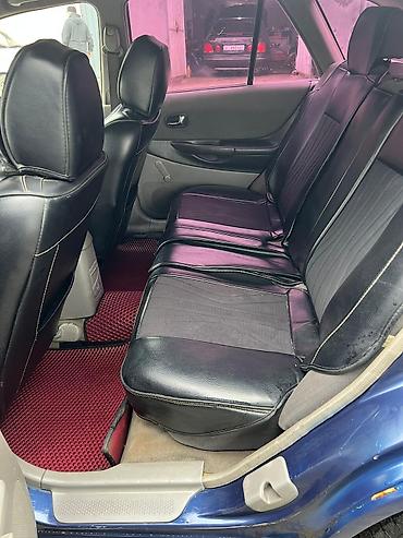 Mazda: Mazda 323: 2002 г., 1.6 л, Механика, Бензин, Хэтчбэк — 12