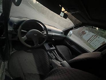 Транспорт: Nissan Serena: 1993 г., 2 л, Механика, Бензин, Минивэн — 6