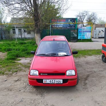 дайхатсу тико: Daihatsu Cuore: 1991 г., 1 л, Механика, Бензин, Хетчбек